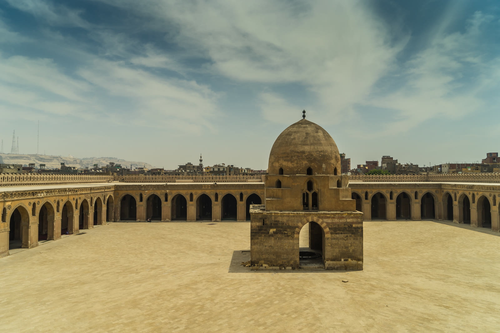 Arcades and fountain house in the broad courtyard of the Mosque of Ibn Tulun