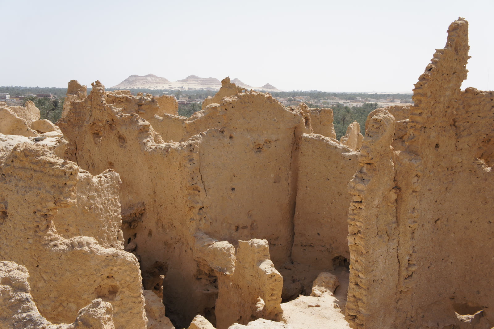 Thick earthen walls and narrow passages in Shali's historic centre at Siwa